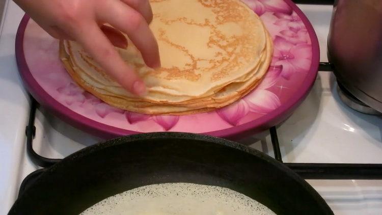 Stack pancakes for cooking.