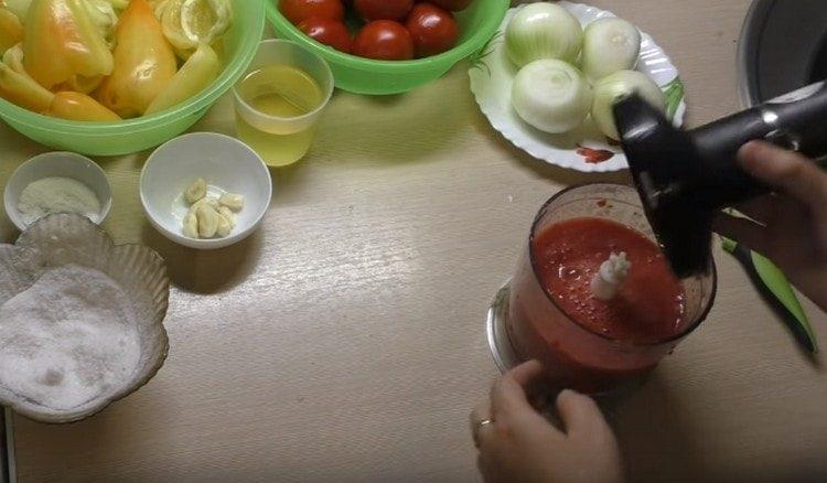 grind tomatoes in a blender.