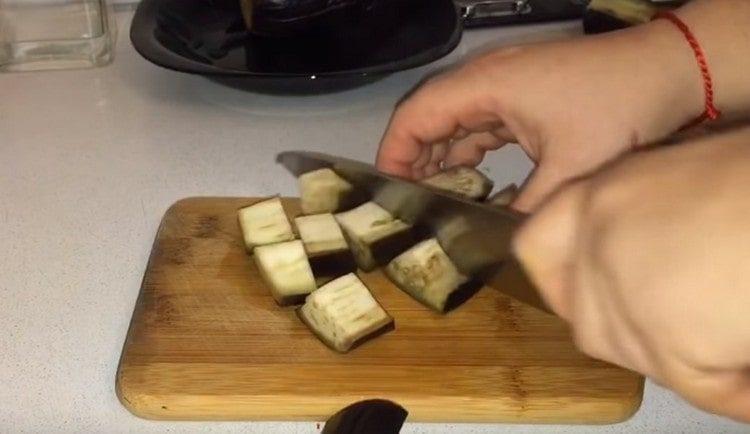 Cut eggplant into large cubes.