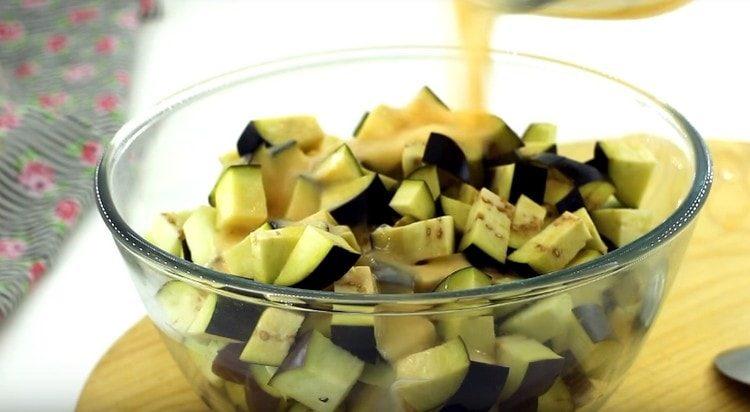 Pour the beaten eggs to the eggplant and mix.