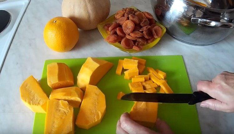 peel the pumpkin and cut into cubes.