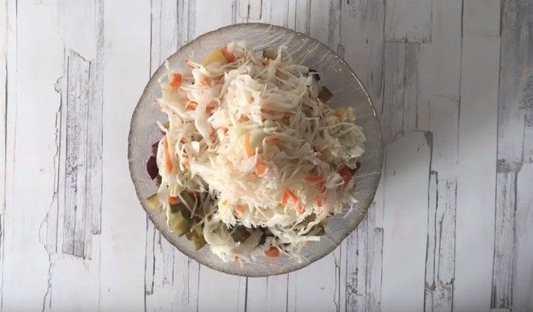 Last, add sauerkraut to the salad.