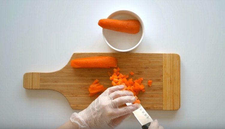 Dice boiled carrots.