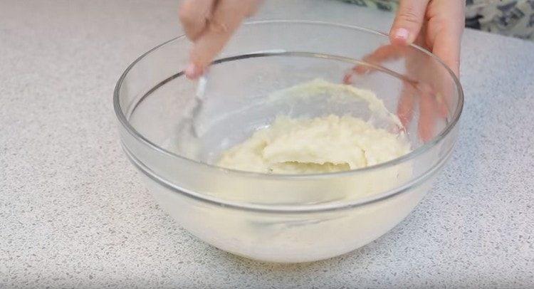 Pour flour into boiling water and mix quickly.