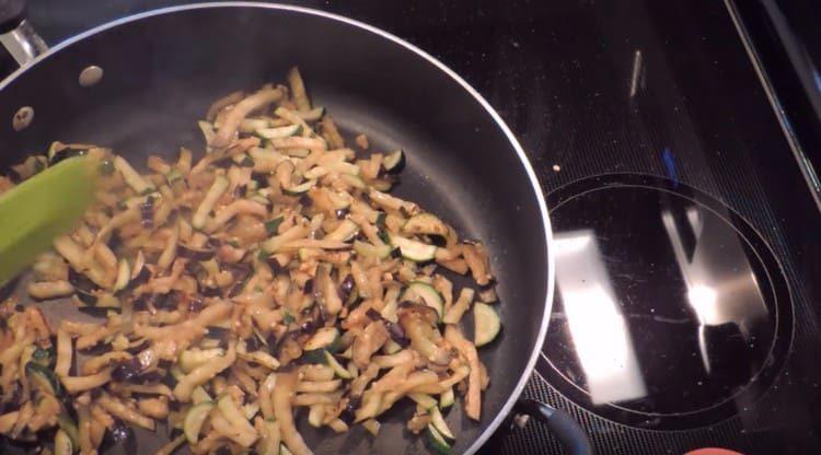 Fry vegetables until golden brown.