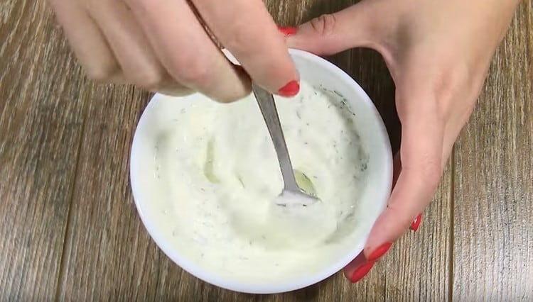 Mix sour cream with salt, pepper and chopped dill.