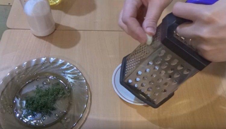 Rub the garlic on a fine grater