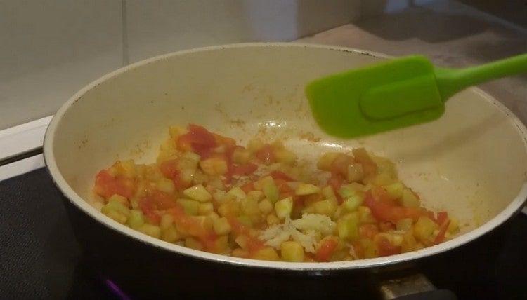 Stew vegetables, add salt, pepper, garlic.