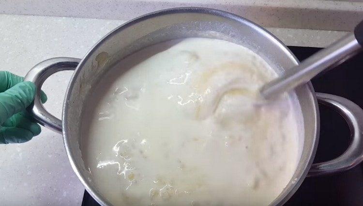 To taste, add cream to the soup.