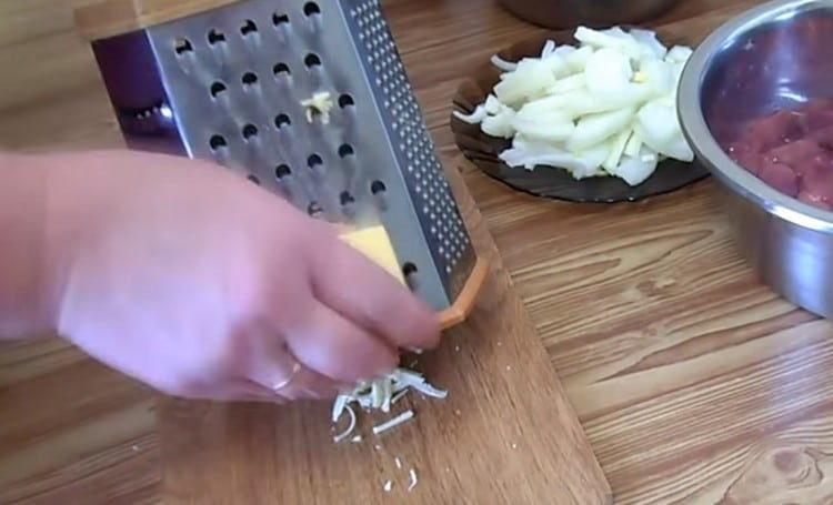 Grate the cheese.