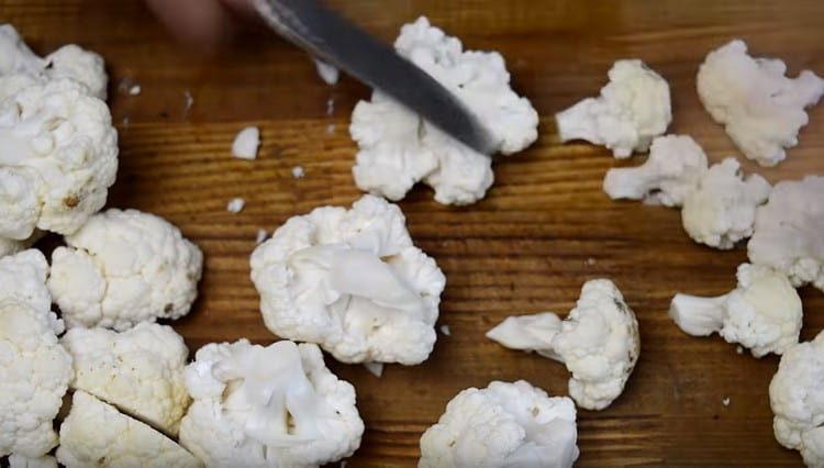 We divide cauliflower into inflorescences.