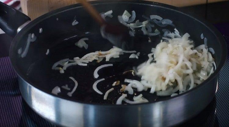 Cut thin onion and fry it in vegetable oil.