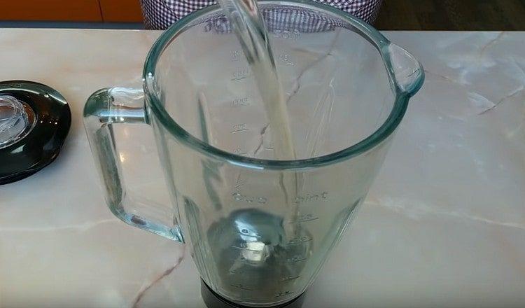 Pour the vegetable oil into the blender bowl.