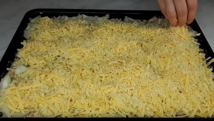 On top of the onion, evenly spread the grated cheese.