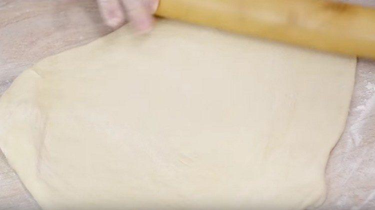 We roll out most of the dough with a rolling pin.