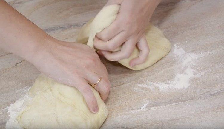 The dough is divided into two parts.