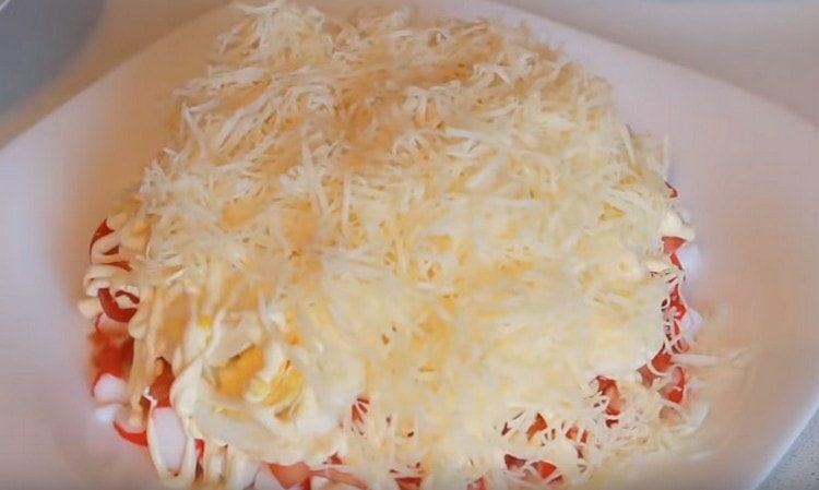spread the grated cheese on top.