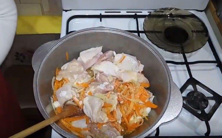 Add chicken to vegetables.