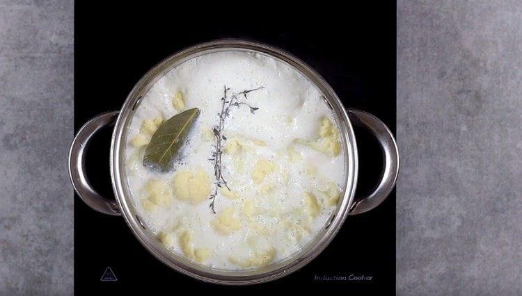 Cook cauliflower in milk.