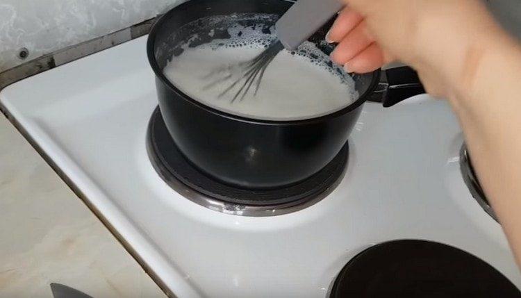Bring the milk to a boil.