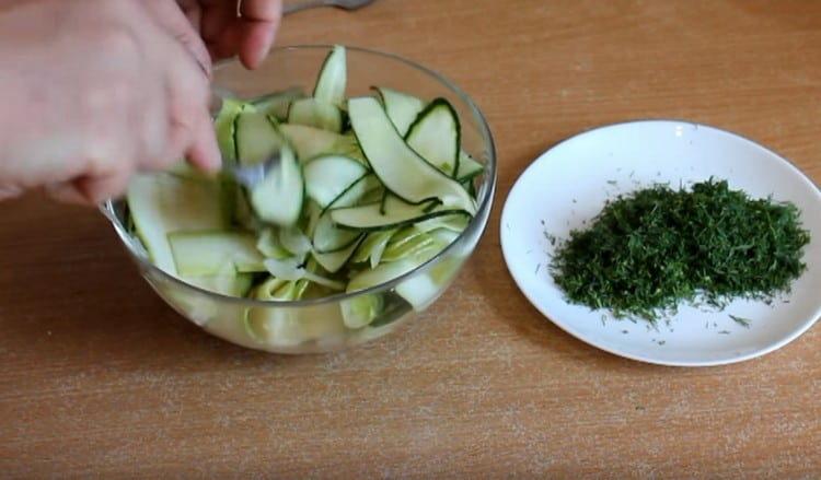 Mix the salad ingredients.
