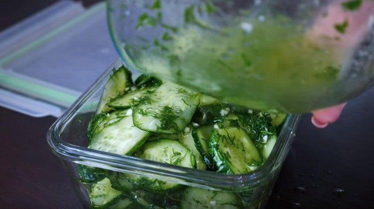 We shift the cucumbers in the pan, pour the marinade. close the lid and put in the refrigerator.