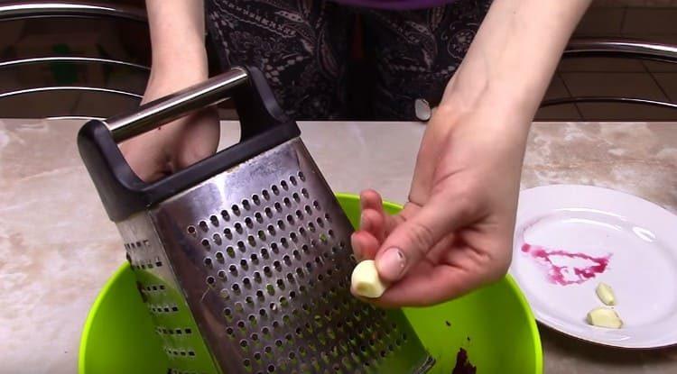 on a grater three also cheese and garlic.