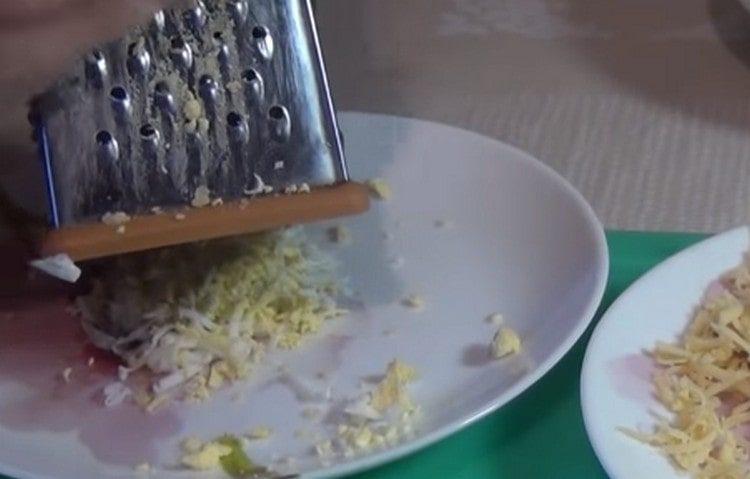 grate boiled eggs.