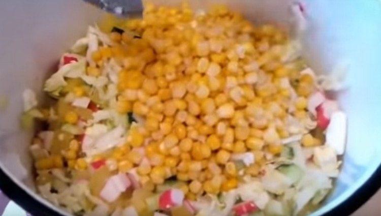 Add corn to all prepared ingredients.