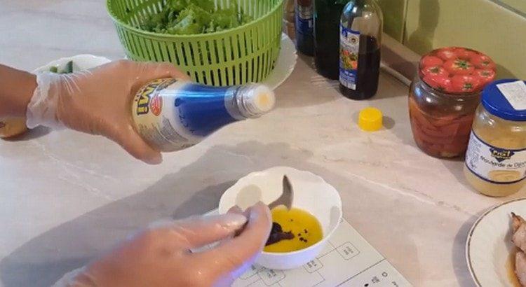 Cooking salad dressing.