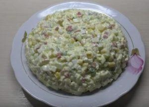 We prepare a light salad with crab sticks and corn according to a step-by-step recipe with a photo.