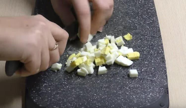 chop finely boiled eggs.