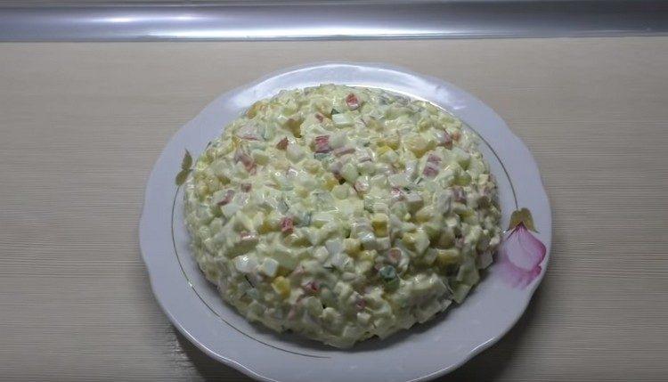 Dressed with crab sticks and corn salad, usually with mayonnaise.