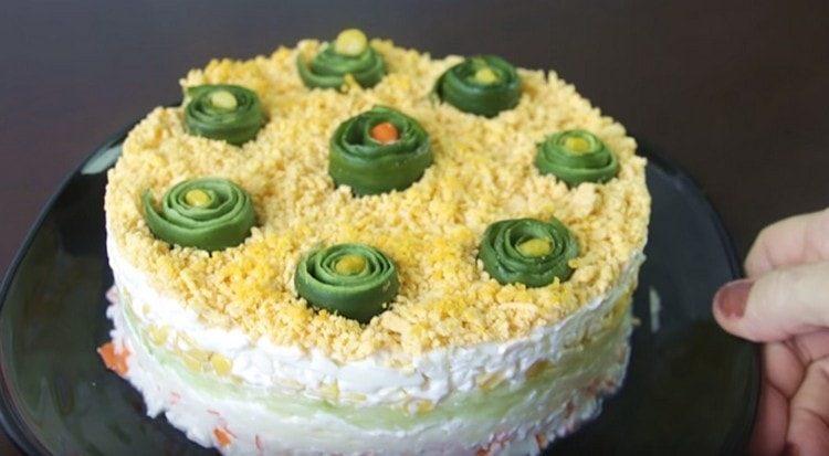 Such a puff salad with crab sticks will decorate any holiday table.