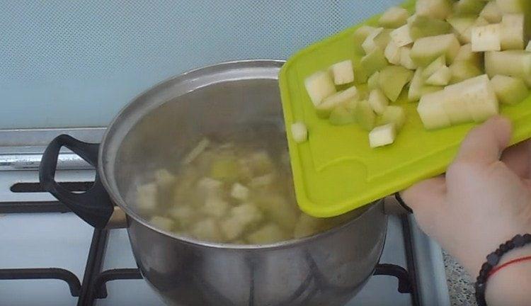 Add zucchini to the potato pan