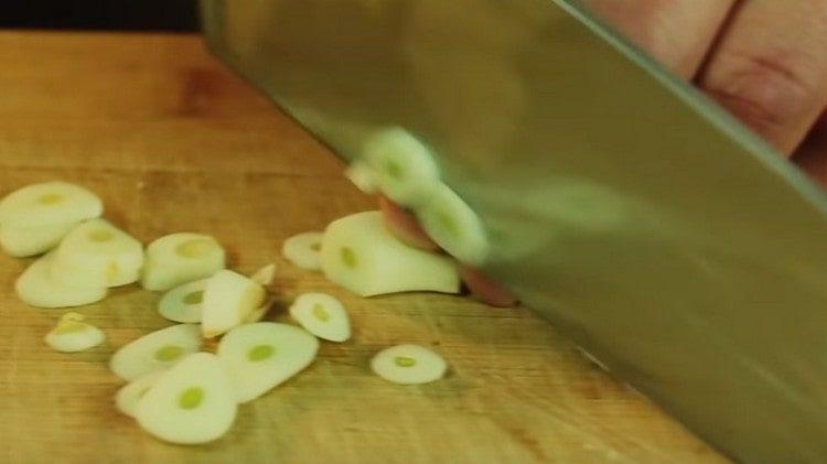 Finely chop the garlic.