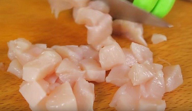 Finely chop the chicken fillet.