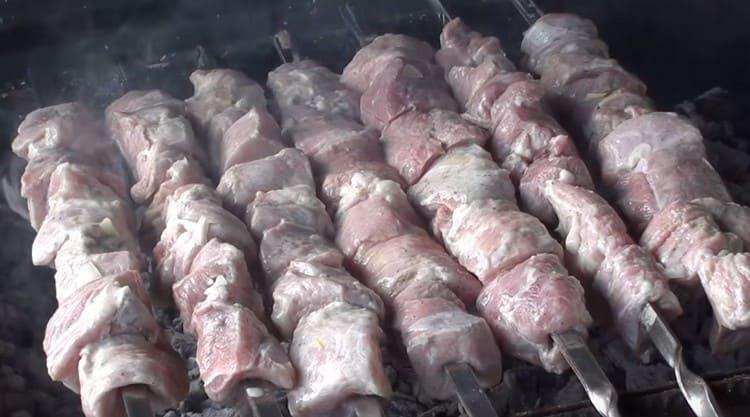 Cooking barbecue on the grill.