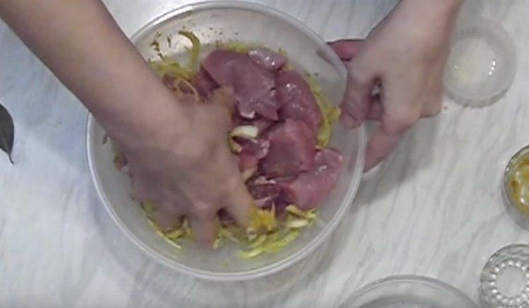 Add the meat to the onion and mix thoroughly.