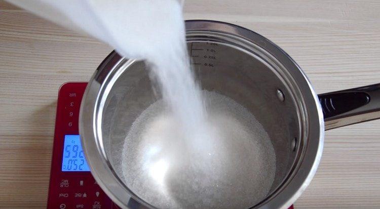 Pour sugar into the stewpan.