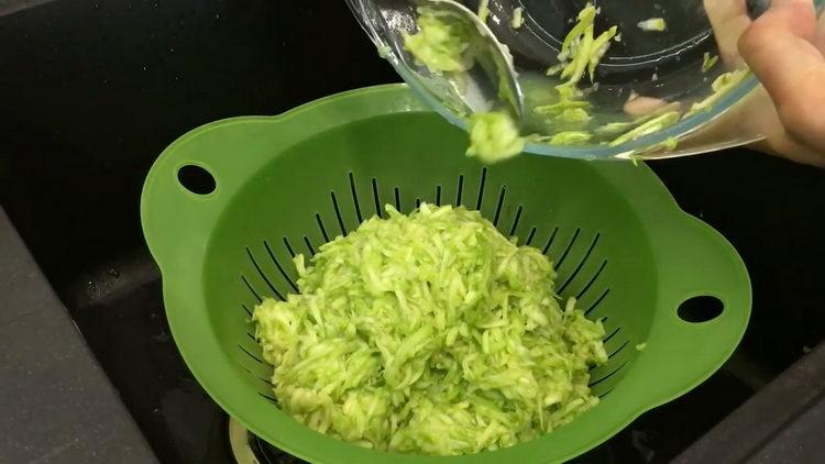 Grate zucchini to cook