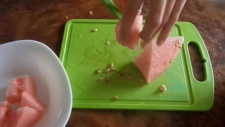 cut the flesh of watermelon into pieces