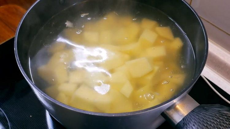 Boil potatoes for cooking
