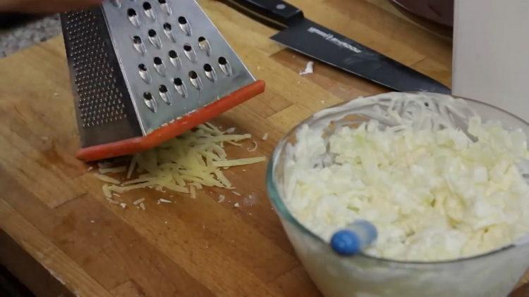 Grate cheese to cook