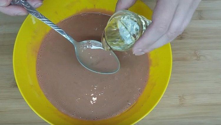 Add vegetable oil to the dough.