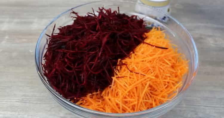 Cooking a salad of raw beets and carrots