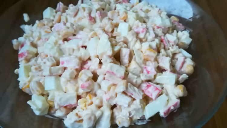 salad with crab sticks and apple ready