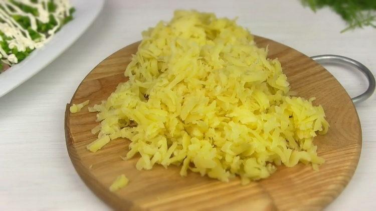 Grate potatoes to cook