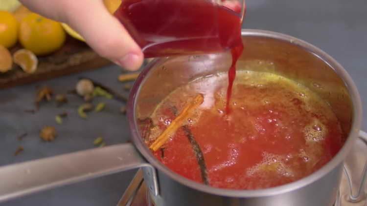 pour pomegranate juice into cider