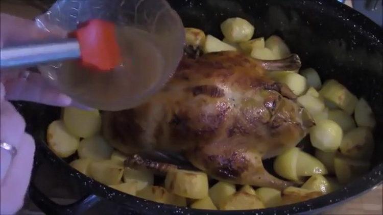 Duck with potatoes in the oven: a step by step recipe with a photo